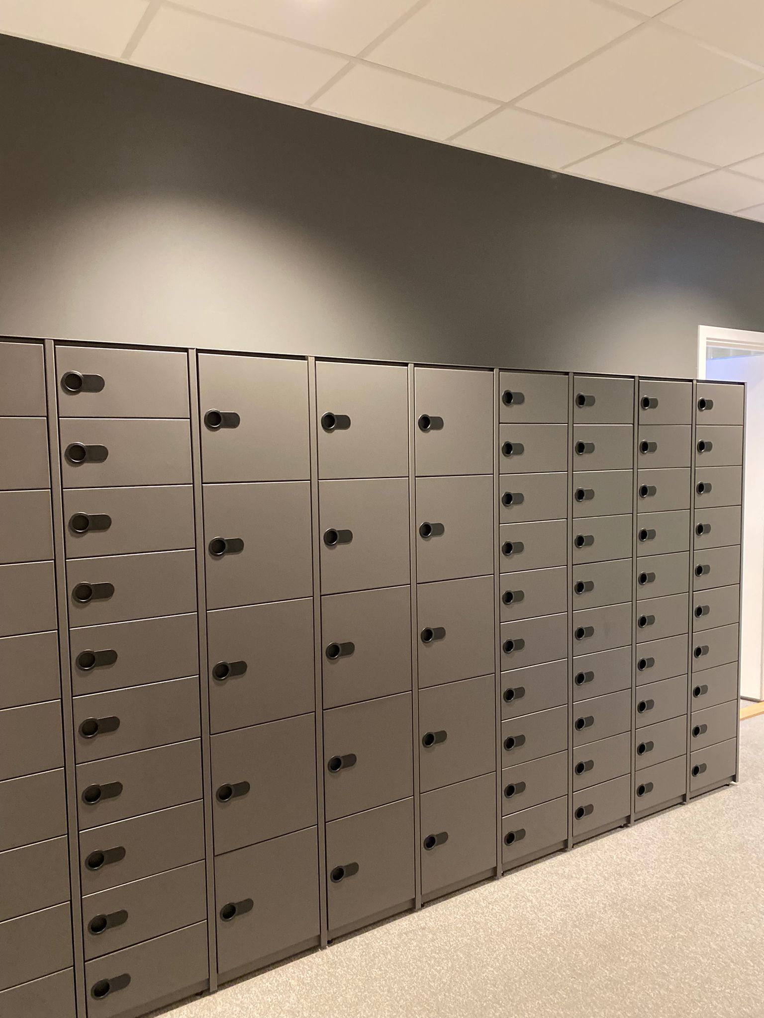 XLOCK smart locker system for bookable employee lockers.